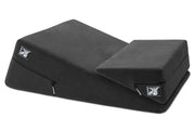 Black microfiber wedge and ramp positioning cushion with Liberator logo.