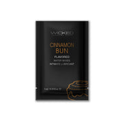 Wicked Cinnamon Bun flavored water-based lubricant sachet.