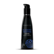Black bottle of Wicked Blueberry Muffin flavored water-based intimate lubricant.