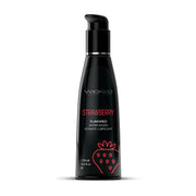 Black bottle of Wicked Sensual Care strawberry flavored water-based lubricant.