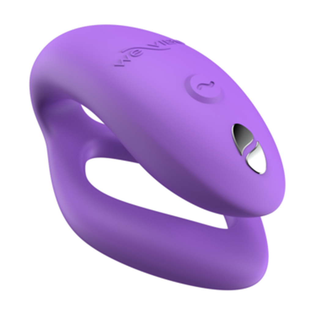 A purple C-shaped vibrator with a silver button and embossed logo.