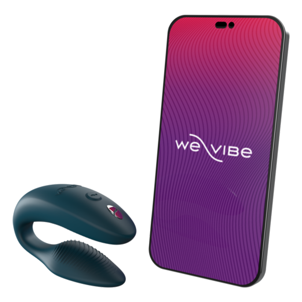 A green velvet app-controlled couples vibrator next to a smartphone.