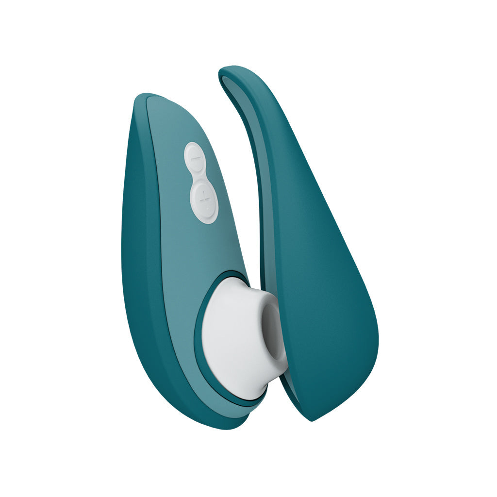 A teal Womanizer Liberty 2 pleasure air stimulator with white buttons.