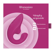 Womanizer Blend dual stimulation rabbit vibrator in vibrant pink.
