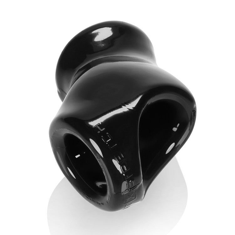 Black X-Stretch cock sling and ball stretcher with textured surface.
