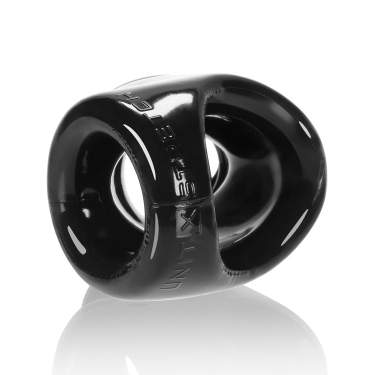 Black X-Stretch cock sling and ball stretcher with embossed text.