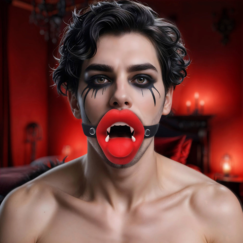 Vibrating vampire mouth gag with red lips and fangs.