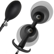 Weighted inflatable silicone anal beads with a pump.