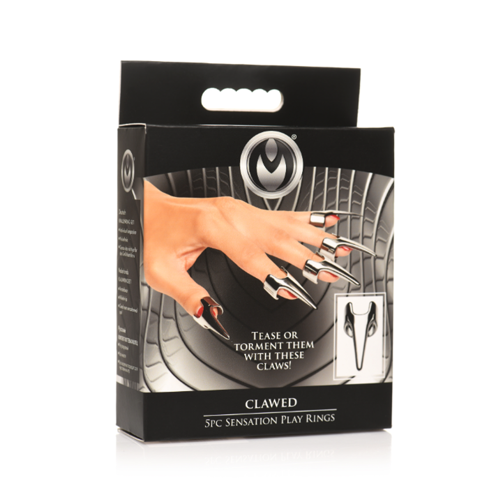 Stainless steel claw rings on a hand, with product packaging.
