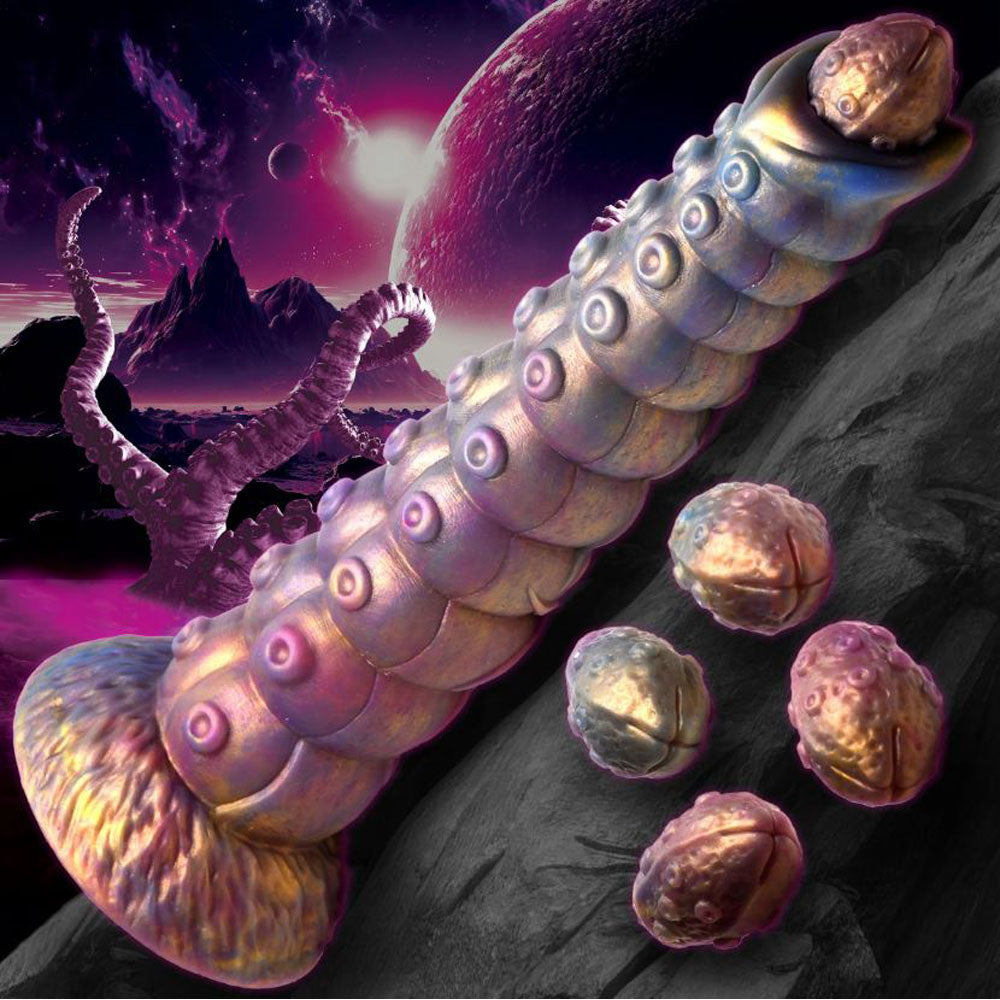 A textured, iridescent tentacle dildo with a suction cup base and four removable egg-shaped attachments.