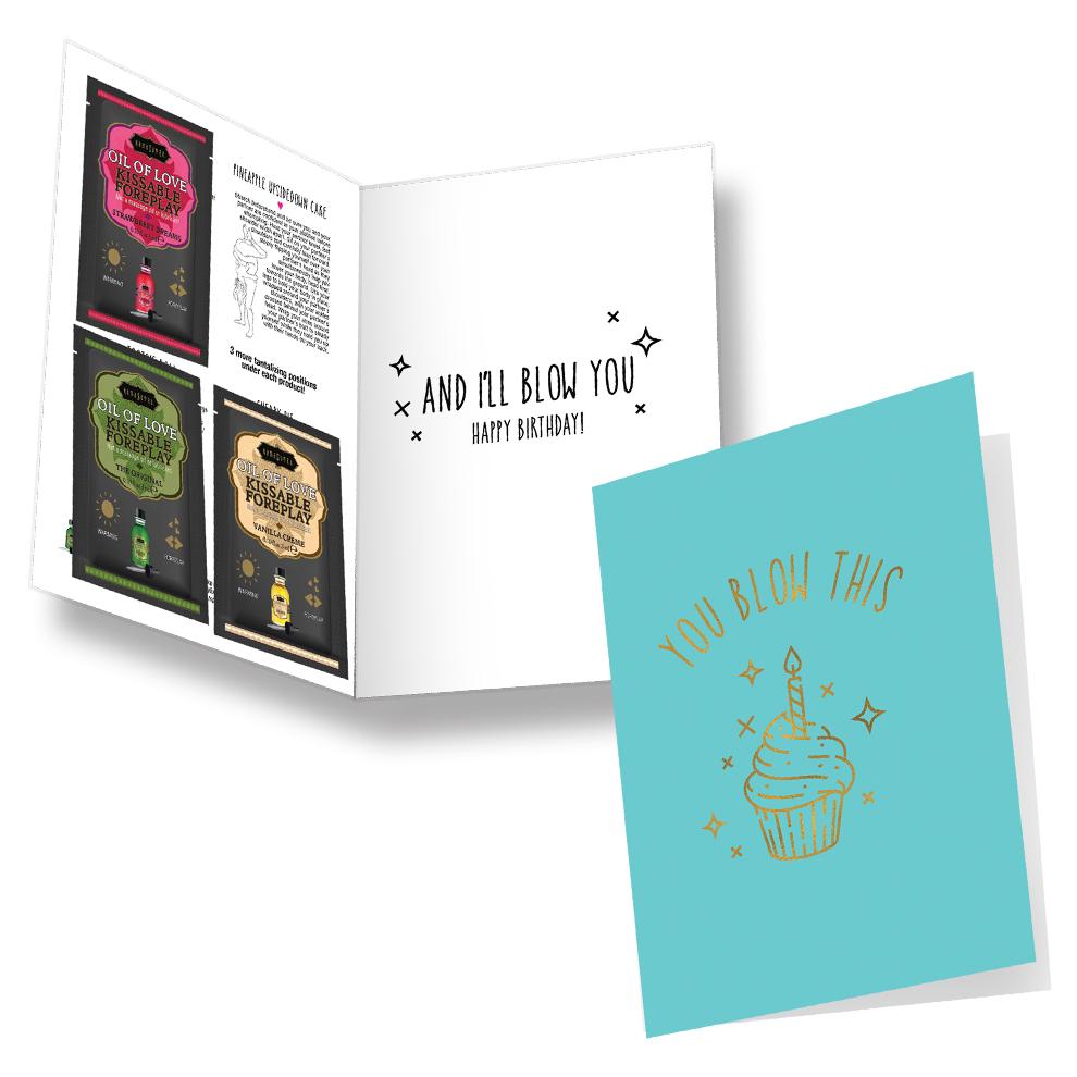 A greeting card with a birthday message and three packets of warming oil.
